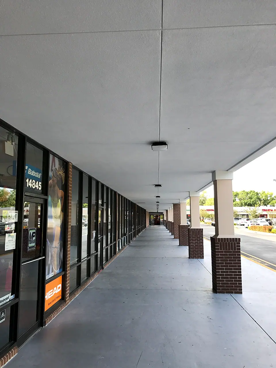 Long view of the finished storefront walkway
