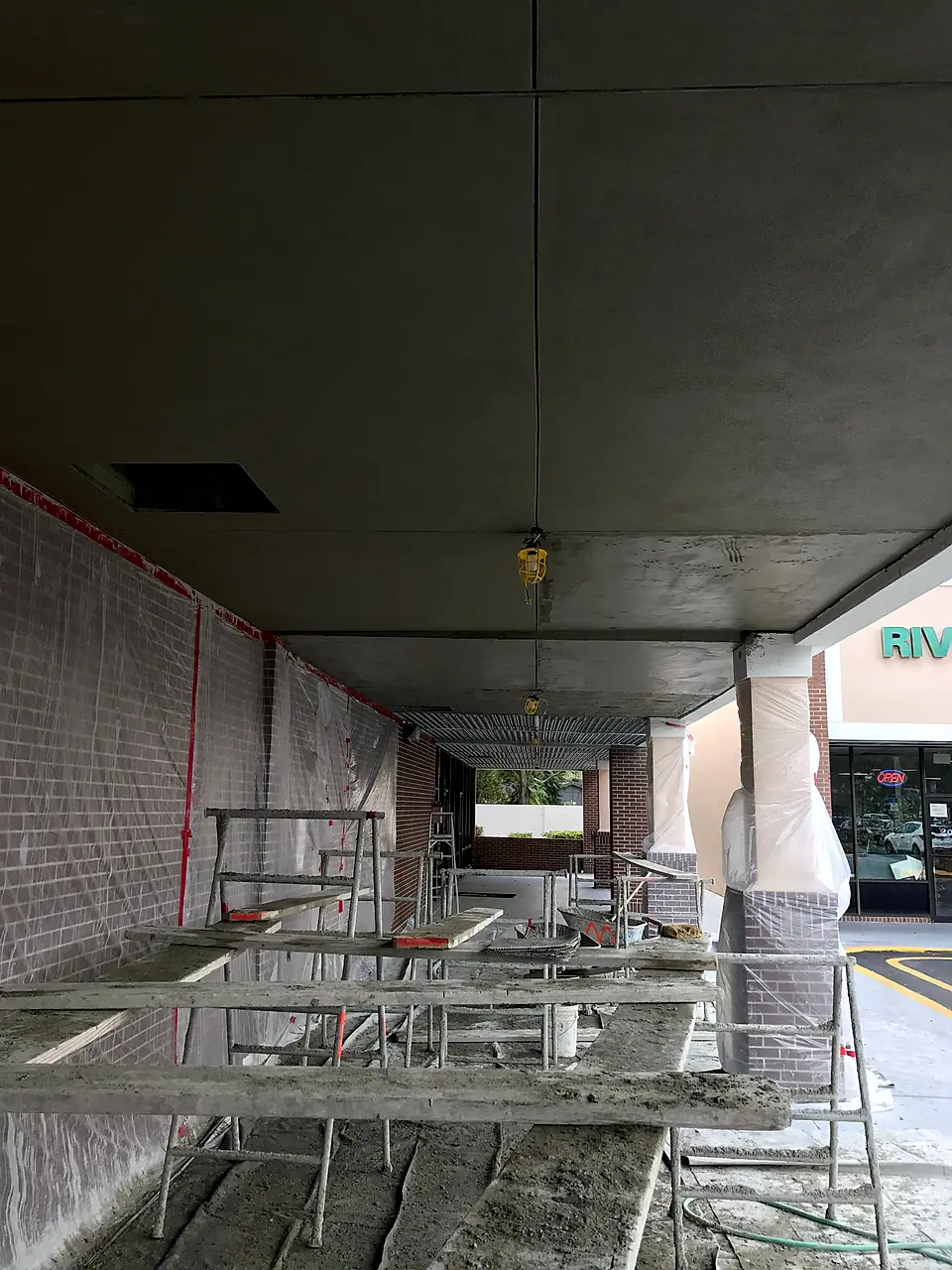 Shopping center walkway torn down to the deck during a renovation