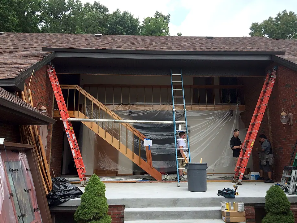 Front entry opened up, staircase framed and ladders up during the rebuild