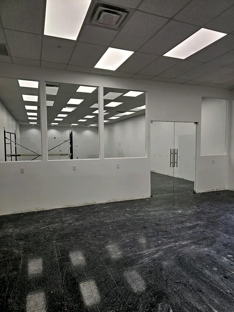 Office suite with walls finished and the floor prepped for new flooring