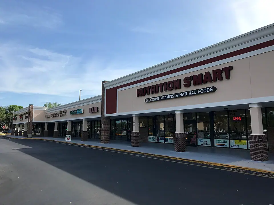 The finished shopping center front from the parking lot