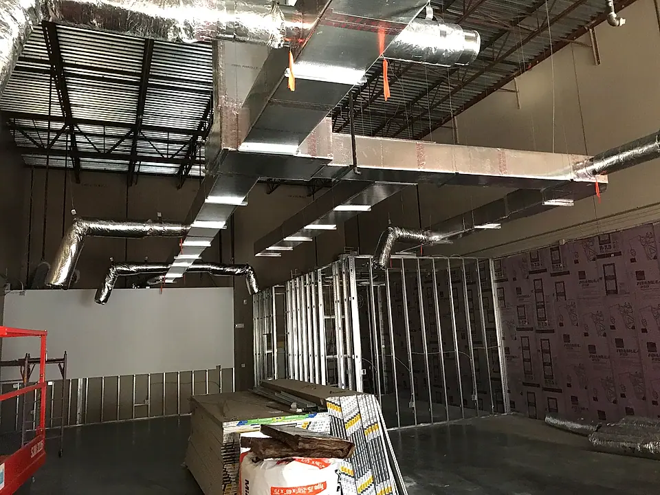 Ductwork and metal-stud walls in a warehouse build-out
